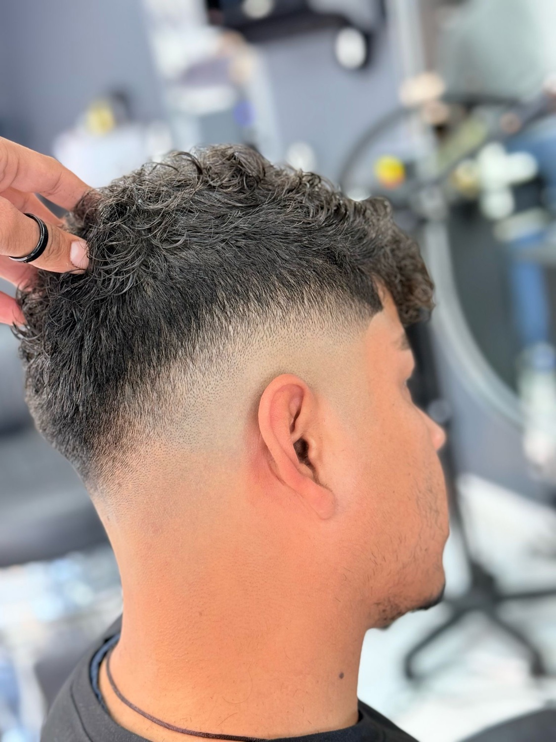 Curly top with a skin fade